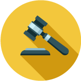 Gray gavel on a yellow background